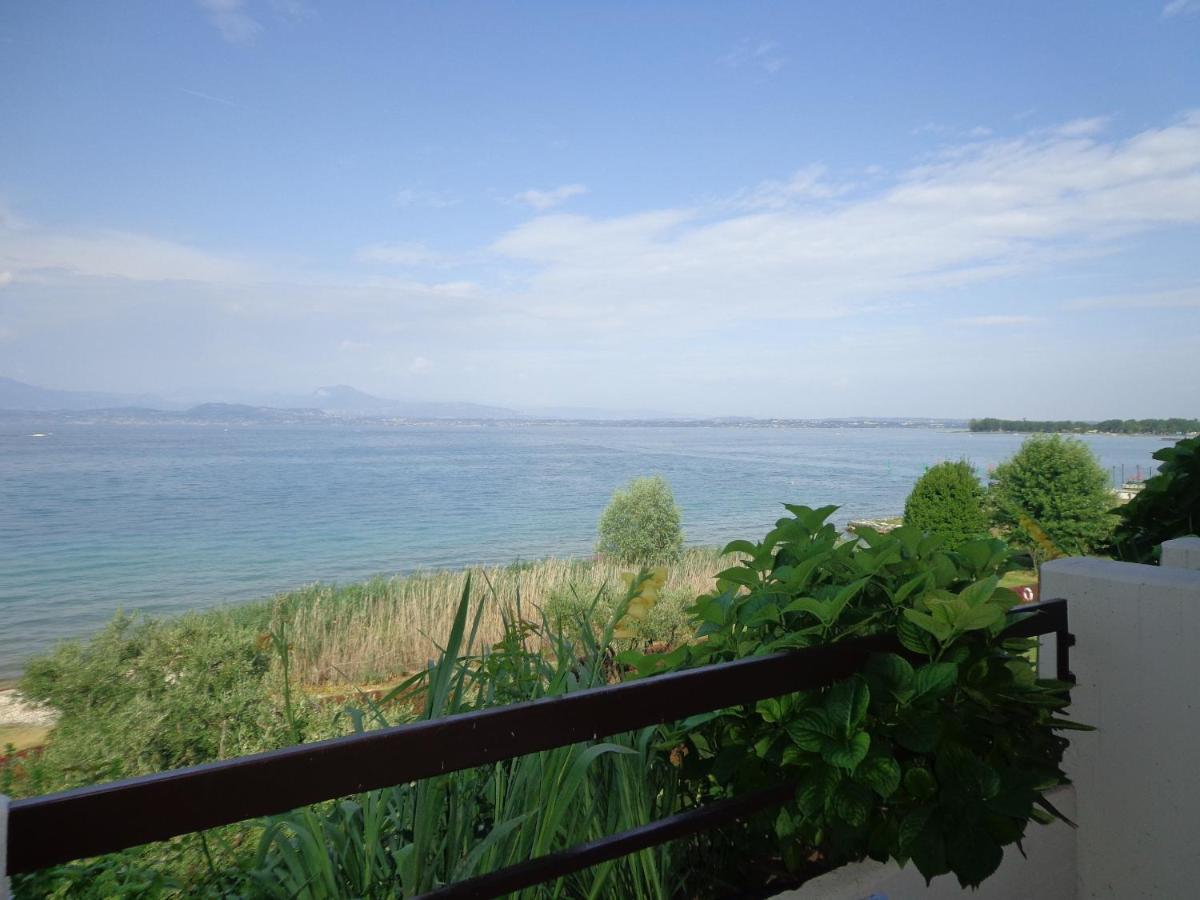 Сasa de vacaciones Bmp Orchidea Piscina, Giardino E Con Molo Sirmione